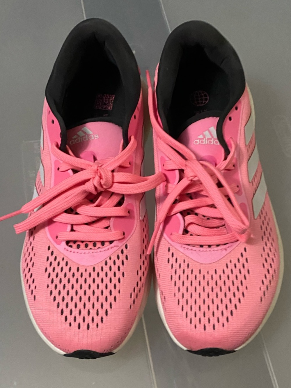 adidas Women's Pink Athletic Running Shoes with White Stripes